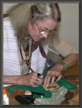 Suzanne cutting a picture