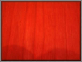 Red coloured veneer